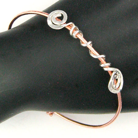 Copper adjustable bangle with sterling accents
